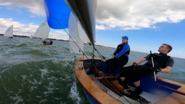 ST921 racing in the SigneT Nationals at Dabchicks 2022 under spinnaker, viewed from transom